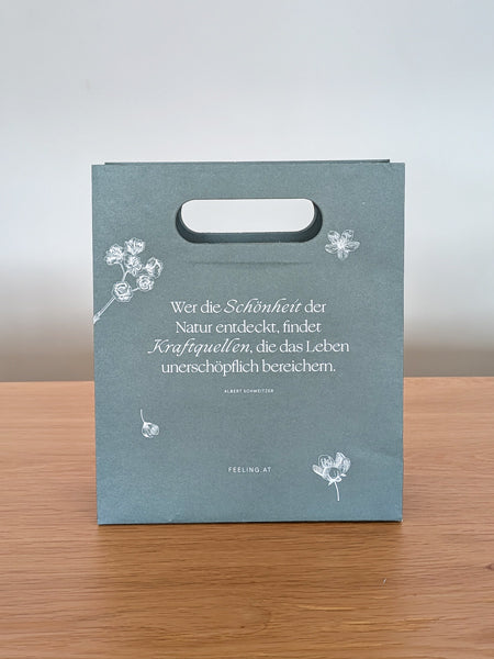 Paperikassi kahva-aukolla